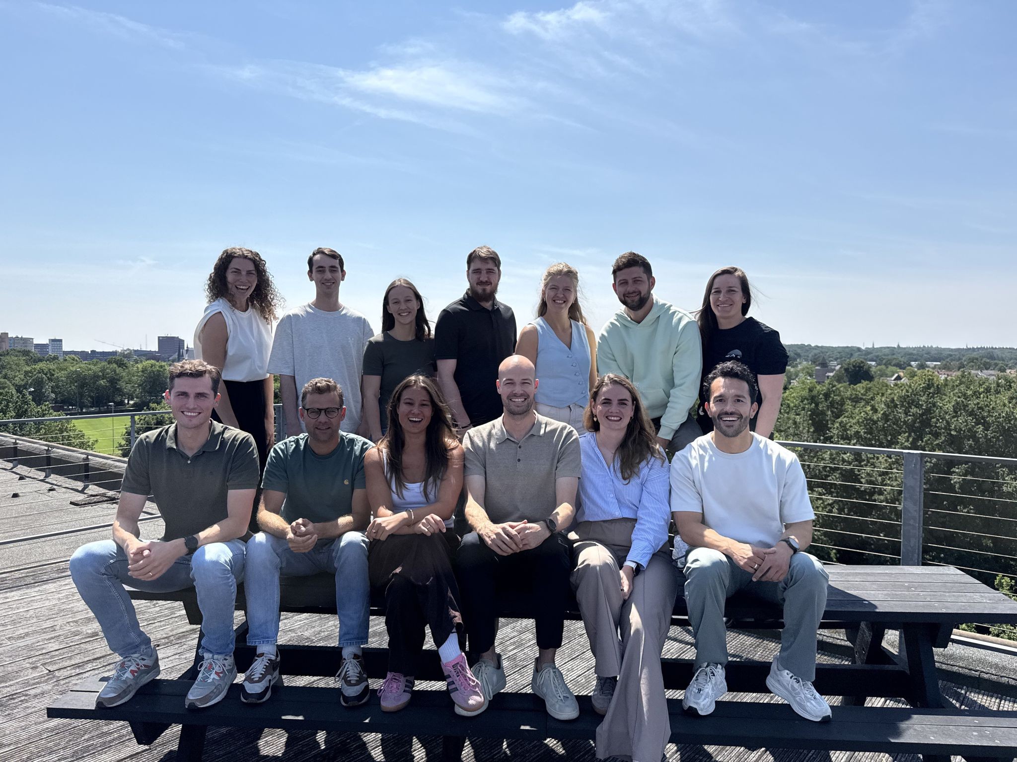 Het team van Codi op kantoor
